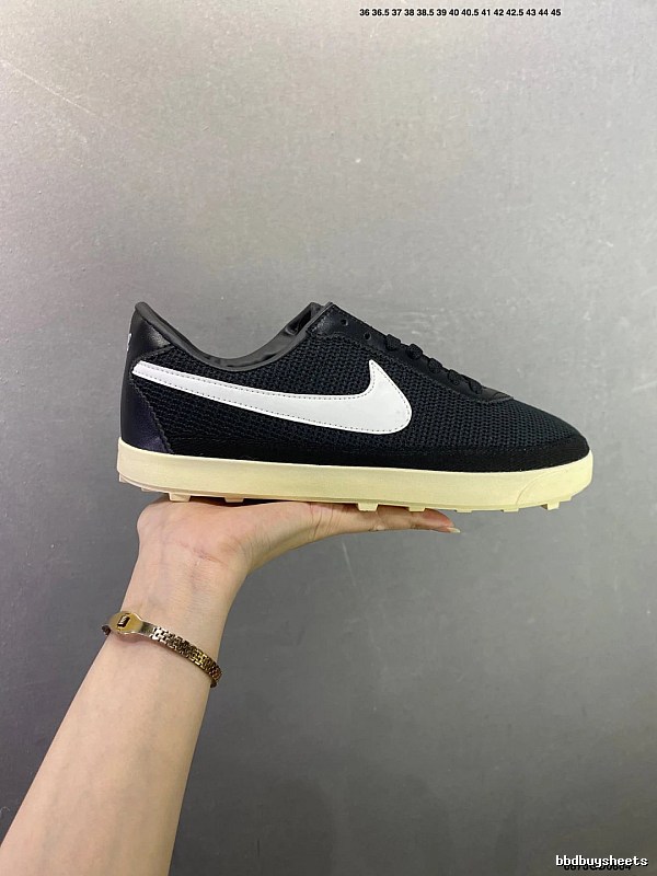 Nike Black and White Waffle-Sole Runners Highlighting Retro Heel Shape