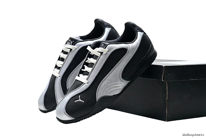 PUMA retro style black and silver sports shoes