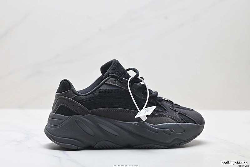 Retro-style black Yeezy 700 shoes